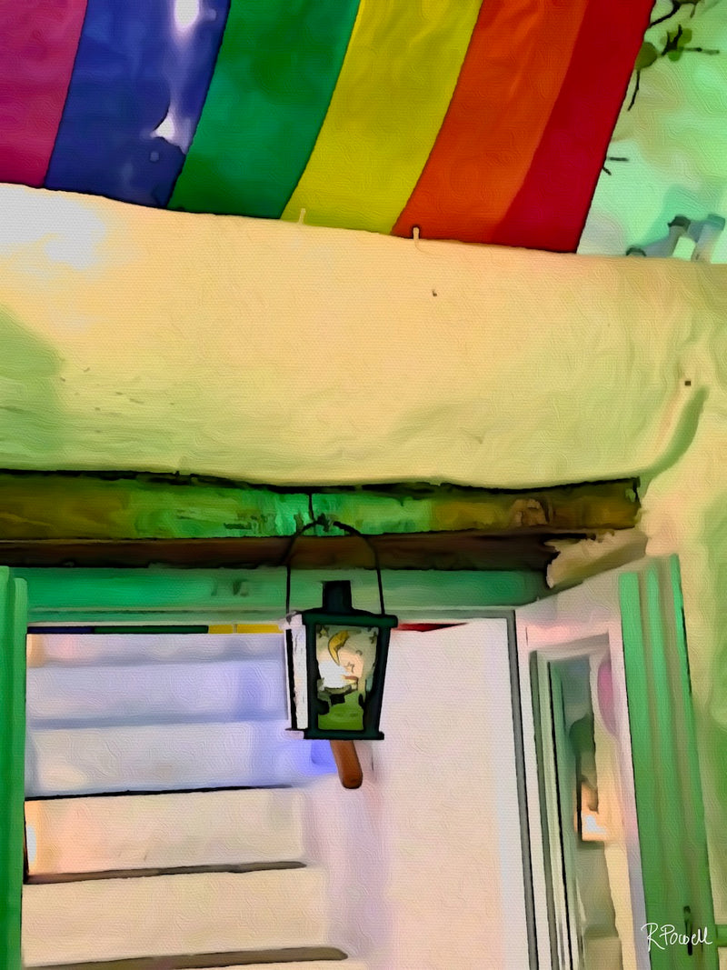 Colourful striped canopy above whitewashed stairs and a glowing painted lantern in a Greek taverna. Artwork by Rosalie Powell.