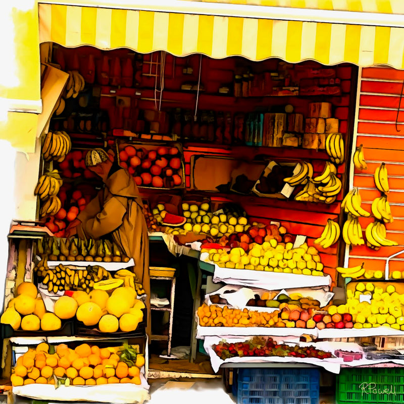 Painting of a Moroccan fruit stall with a vendor in traditional dress arranging produce. Colorful fruits like bananas, oranges, lemons, and pomegranates fill the stand, framed by a yellow-striped awning and bright orange walls. The following images show the same artwork displayed in different interior settings.