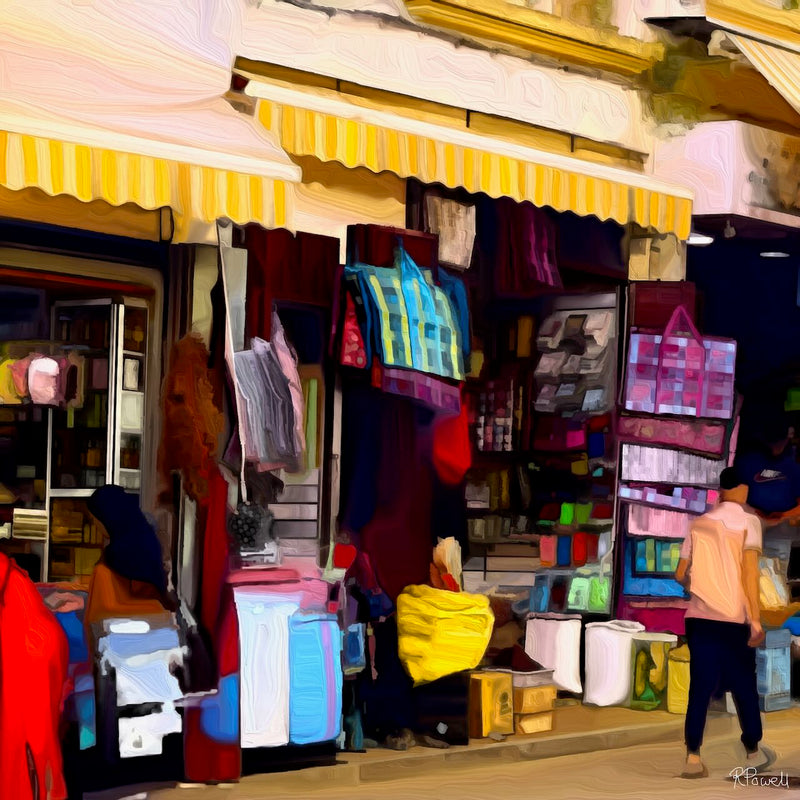 Painting of a Moroccan street stall filled with colorful goods under a yellow awning, with people shopping and walking past. The following images show the same artwork displayed in different interior settings.