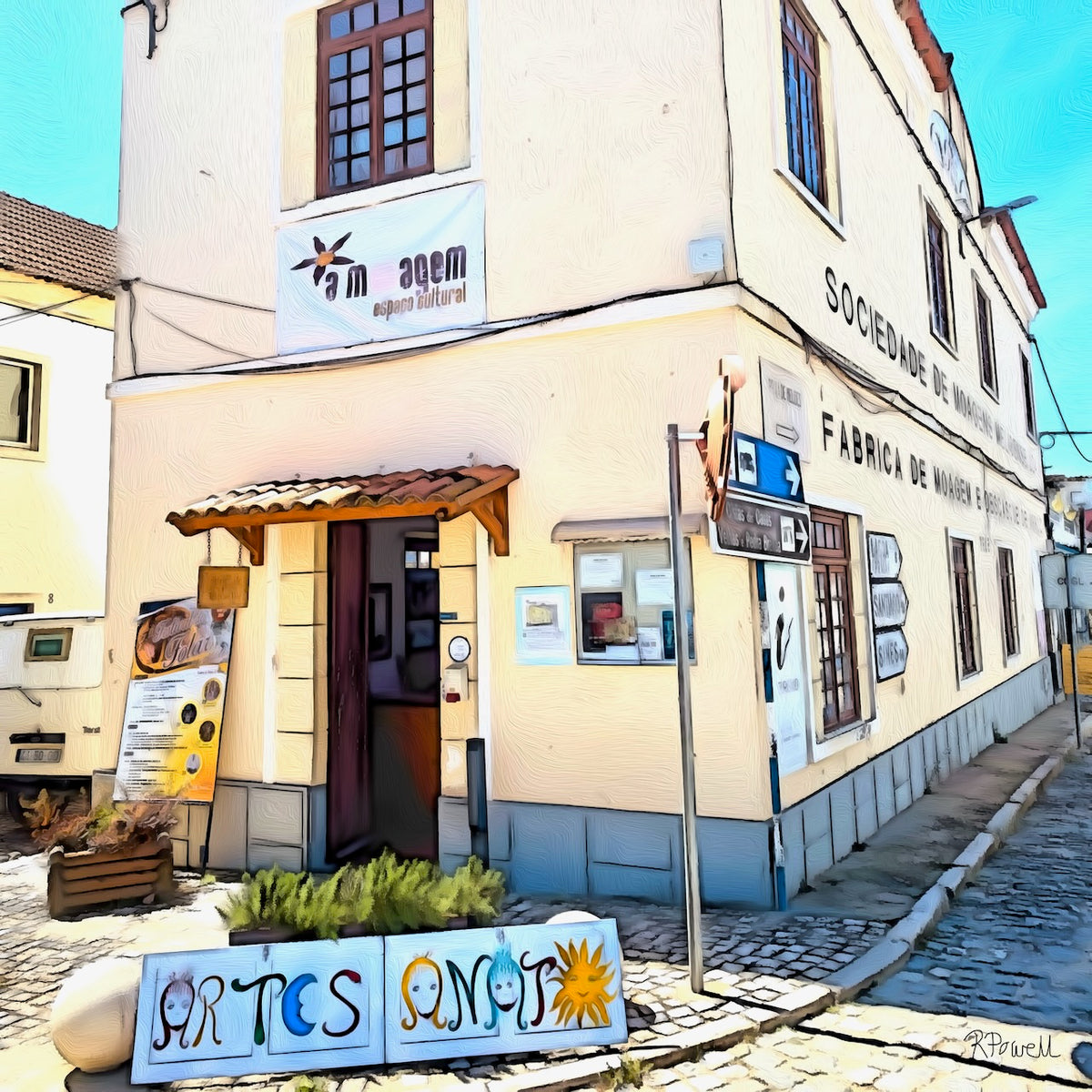 Painting of a corner building in Melides, Portugal, with cobblestone streets, cream-colored walls, and signs for a cultural and artisan space. A colorful handmade “Artesanato” sign and posters adorn the entrance under a small tiled awning. The following images show the same artwork displayed in different interior settings.