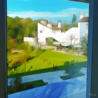Painting of a sunlit Portuguese courtyard seen through a window, with green grass, bare trees, white buildings, and soft blue sky, evoking a peaceful rural Alentejo scene. The following images show the same artwork displayed in different interior settings.