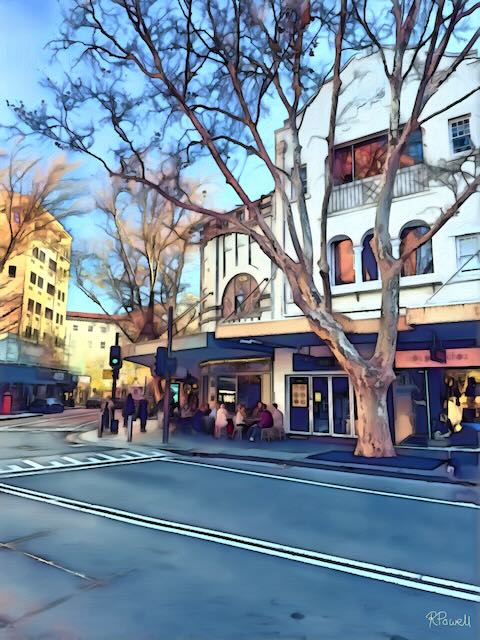 Café on the corner of Macleay Street in Potts Point with people seated outside the La Fontaine building under bare trees, surrounded by classic architecture and soft light. The following images feature the same artwork in different interior settings.