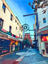 Lankelly Place laneway in Potts Point with early morning light, closed shopfronts including Franco’s, a large sculptural clock suspended overhead, and a quiet, tiled pedestrian path. The following images feature the same artwork in different interior settings.